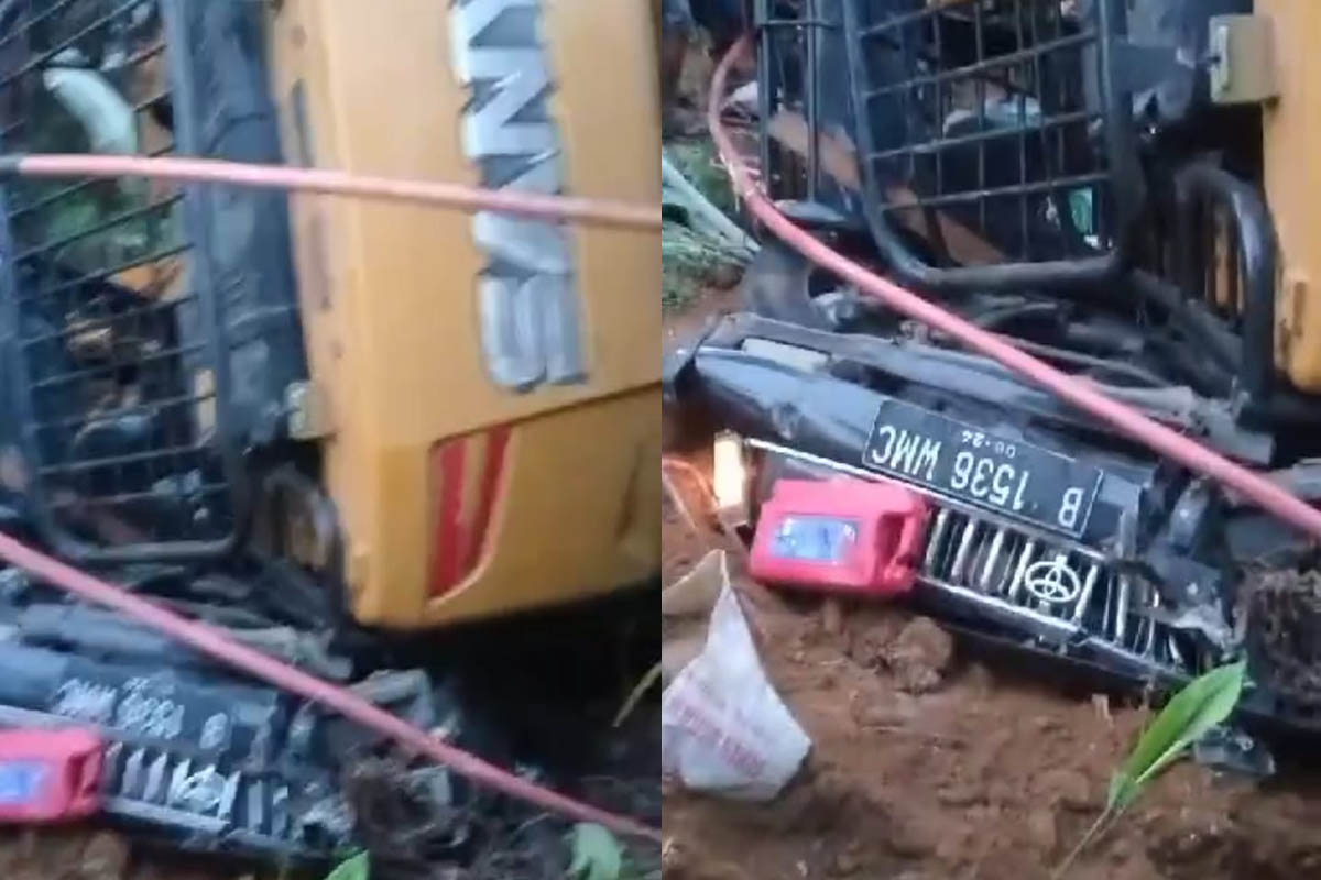 Tronton Bawa Alat Berat Timpa Mobil Pribadi di Jalan Nasional Bukit Damri Mukomuko