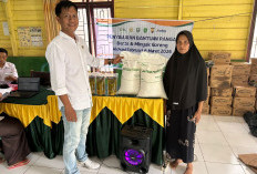Pemdes Talang Petai Salurkan Bantuan Pangan Beras dan Migor